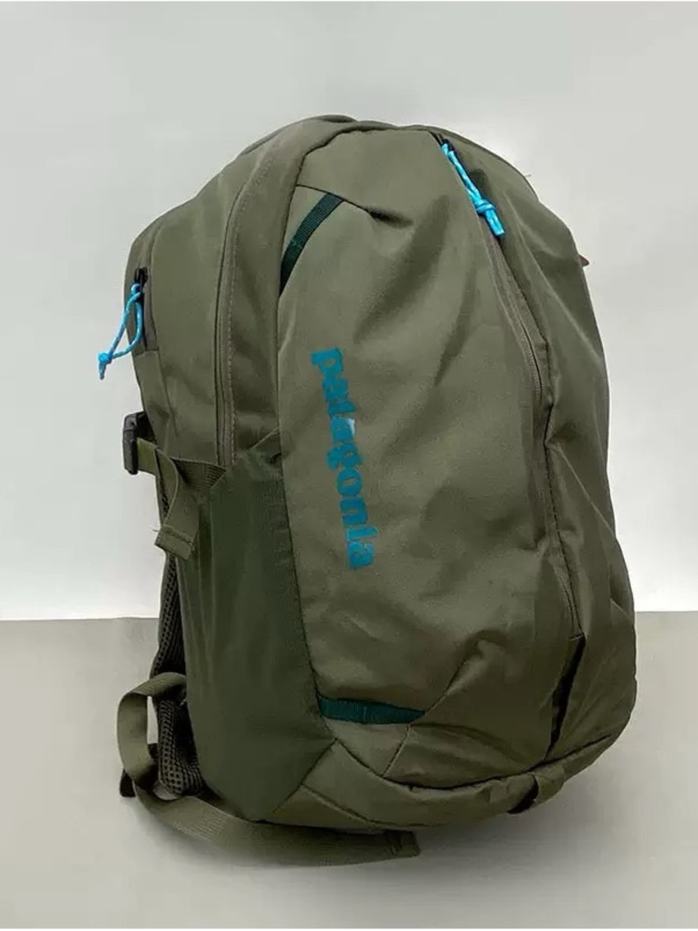 Patagonia Olive Green Backpack with Teal Accents